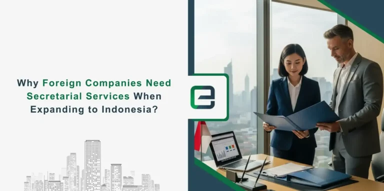 Two business professionals reviewing documents in a modern Jakarta office with Indonesian flag and city skyline in background, representing company secretarial services for foreign businesses expanding to Indonesia.